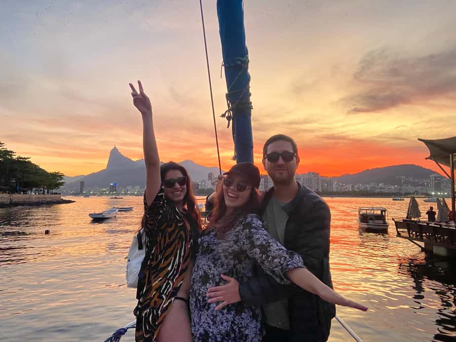 Rio de Janeiro: Sunset Sailboat Tour with Open Bar - Music, Photos, and the Planes-Taking-Off Moment